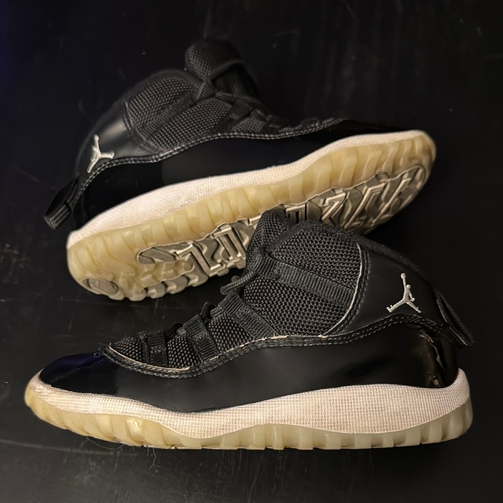 Jordan 11 Black High-Top Sneakers with Durable Sole